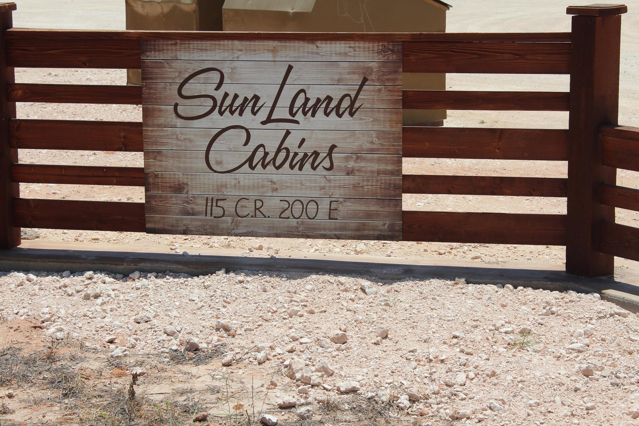 SunLand Cabins entrance sign